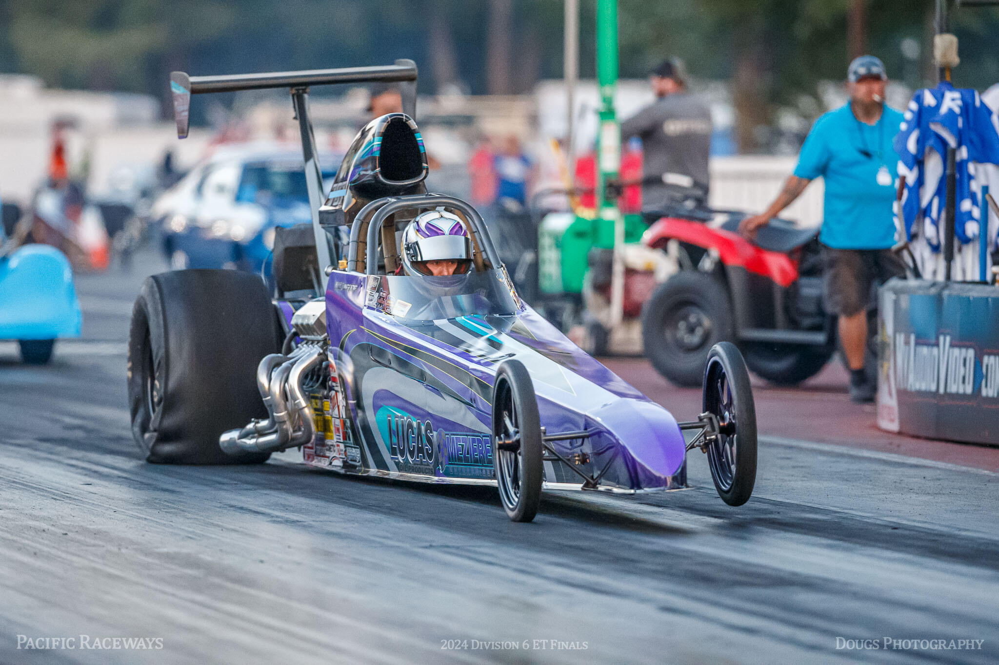 Racer competing at the 2024 NHRA Division Six ET Finals Team Race hosted by Pacific Raceways